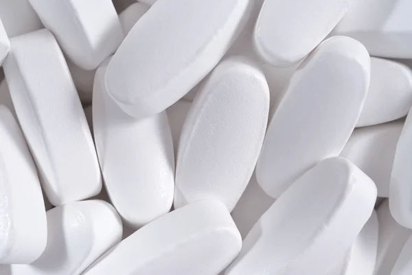 White pills background — Stock Photo, Image