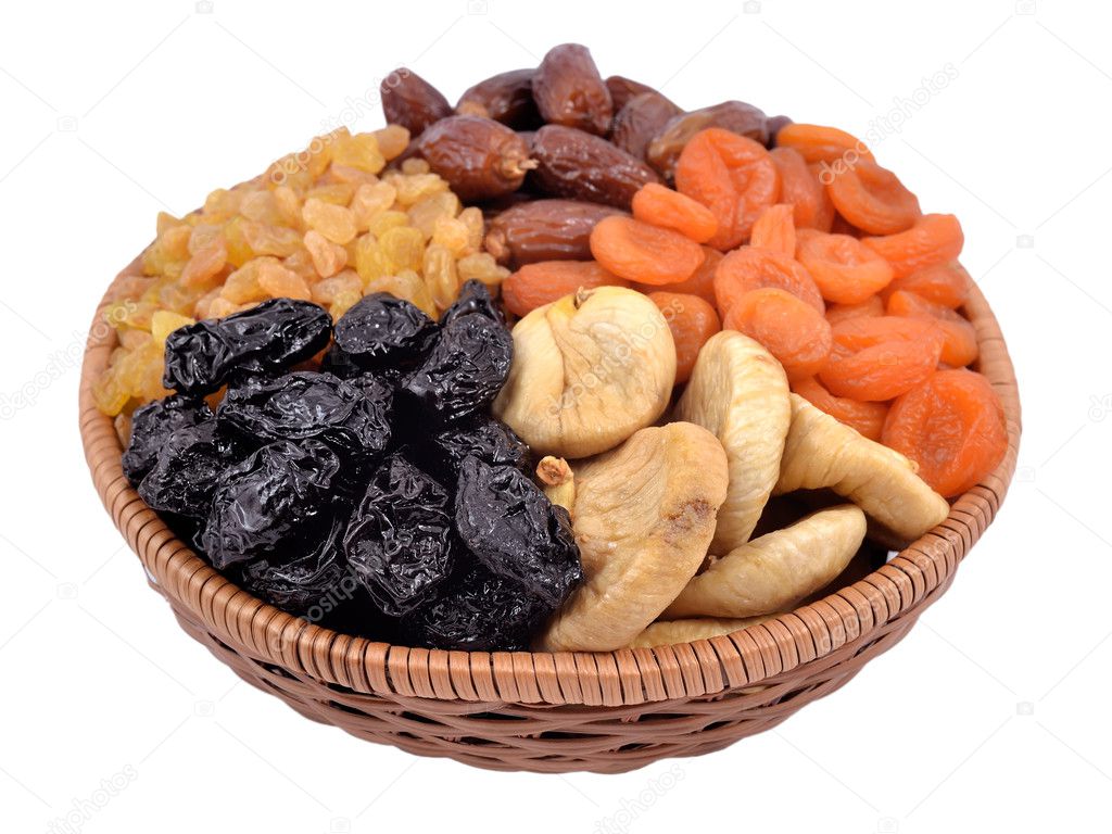 Various dried fruits in wicker bowl