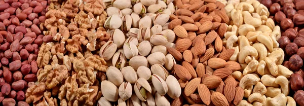 Assorted nuts background — Stock Photo, Image