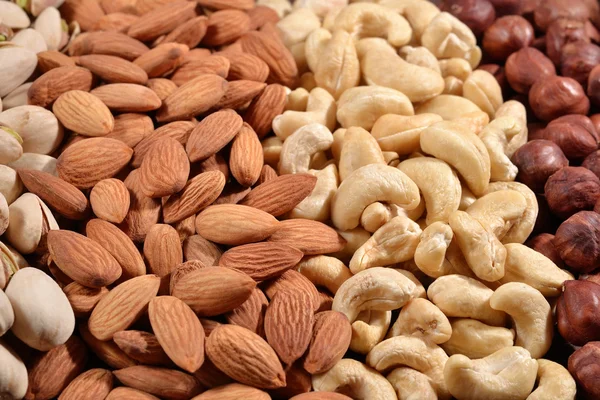 Assorted nuts background — Stock Photo, Image