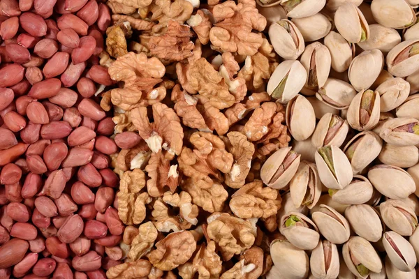 Assorted nuts background — Stock Photo, Image