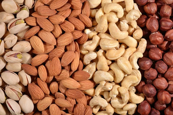 Assorted nuts background — Stock Photo, Image