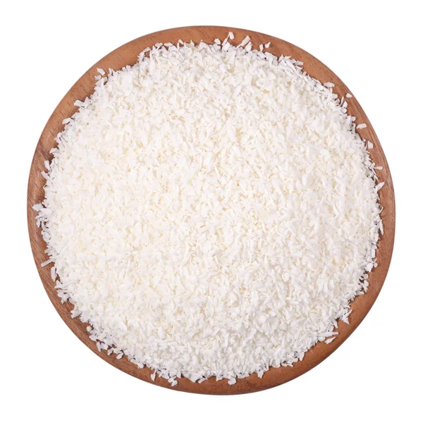 bir beyaz tahta bir kase içinde rendelenmiş hindistan cevizi