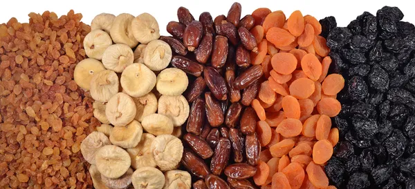 Heap of dried fruits on a white — Stock Photo, Image