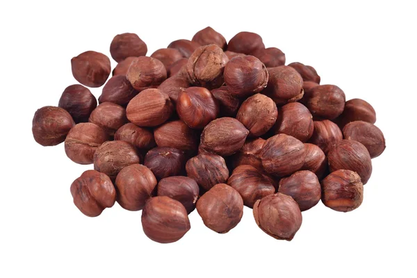 Heap of peeled hazelnuts on a white — Stock Photo, Image