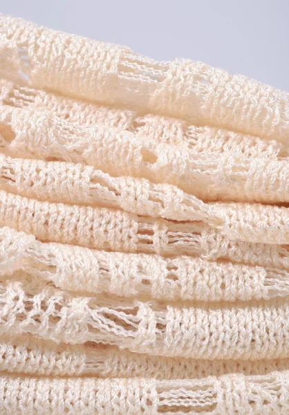 Pilha de aberturas brancas tecido de malha — Fotografia de Stock
