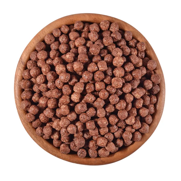 Chocolate cereal balls in a wooden bowl on a white — Stock Photo, Image