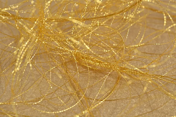 Golden threads close-us selective focus — Stock Photo, Image