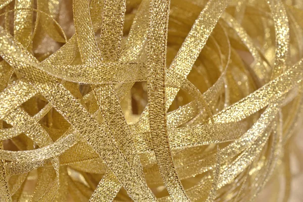 Golden ribbons close up — Stock Photo, Image