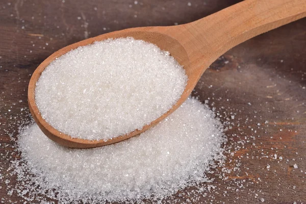 Azúcar blanco en una cuchara — Foto de Stock