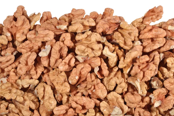 Heap of peeled walnuts on a white — Stock Photo, Image