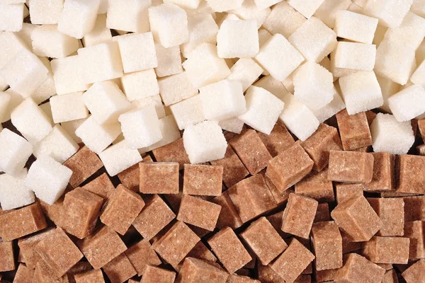 Bruine en witte geraffineerde suiker — Stockfoto