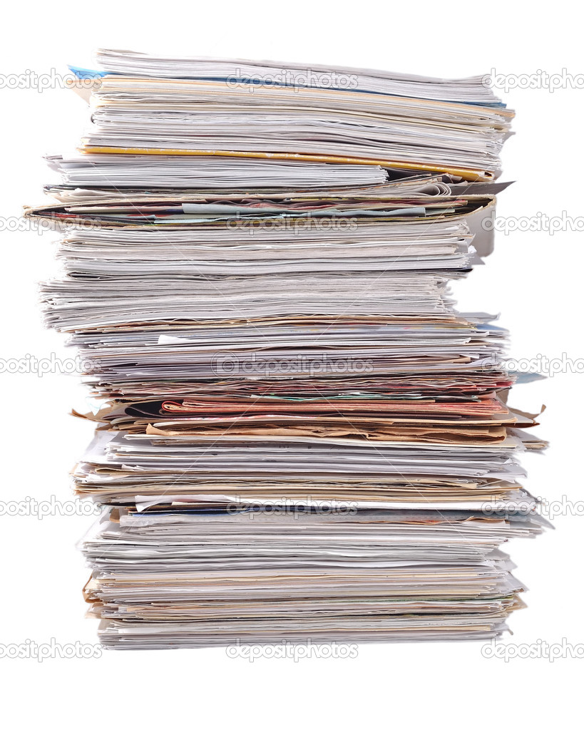 Stack of old magazines on a white