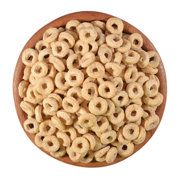 Breakfast cereal rings in a wooden bowl on a white — Stock Photo, Image