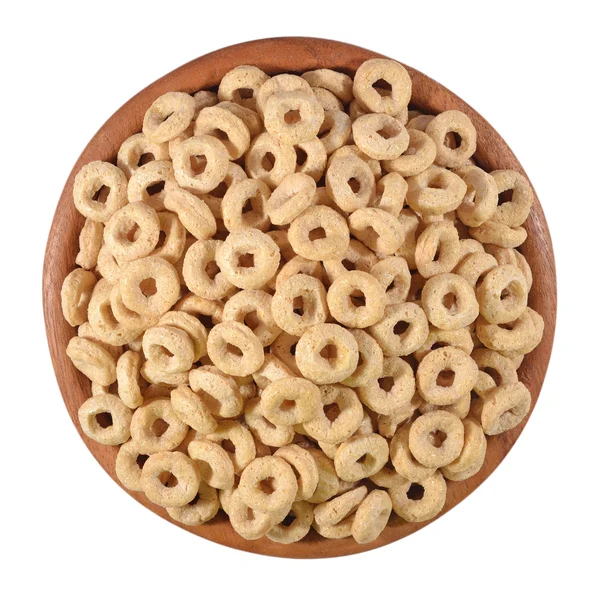 Anillos de cereales para el desayuno en un tazón de madera sobre un blanco —  Fotos de Stock