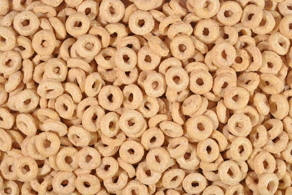 Breakfast cereal rings background — Stock Photo, Image