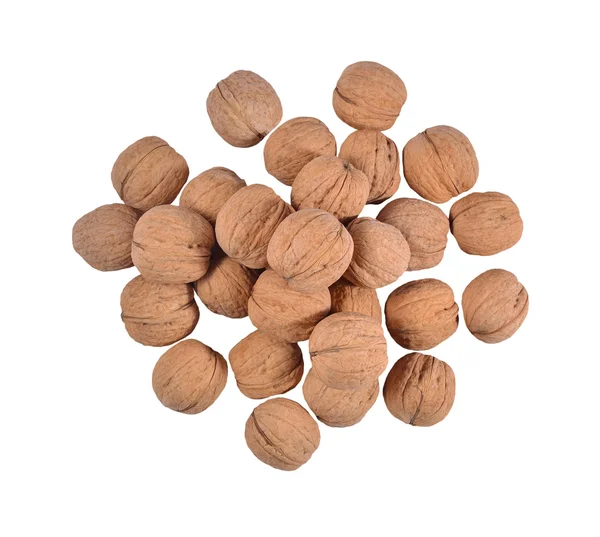 Heap of whole walnuts on a white — Stock Photo, Image