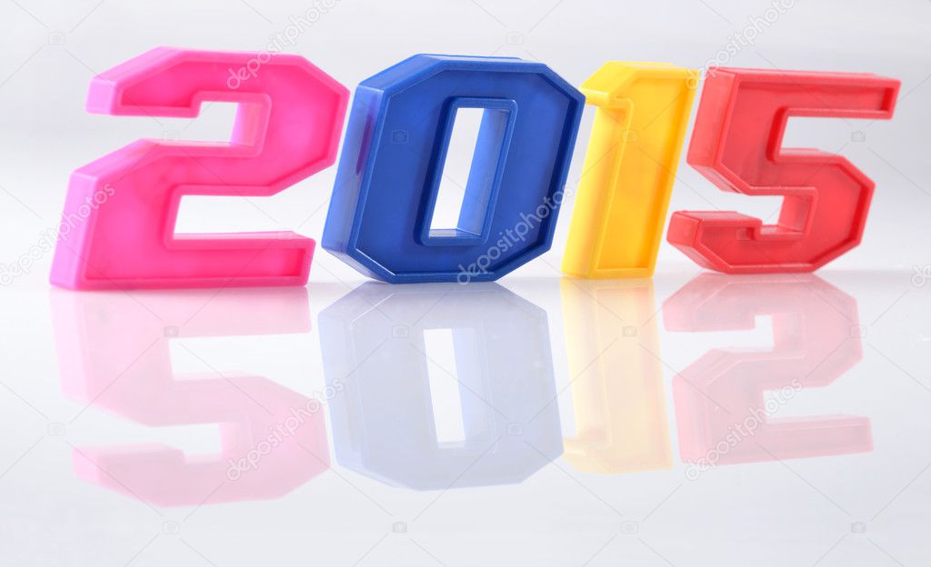 2015 year colorful figures with reflection on white
