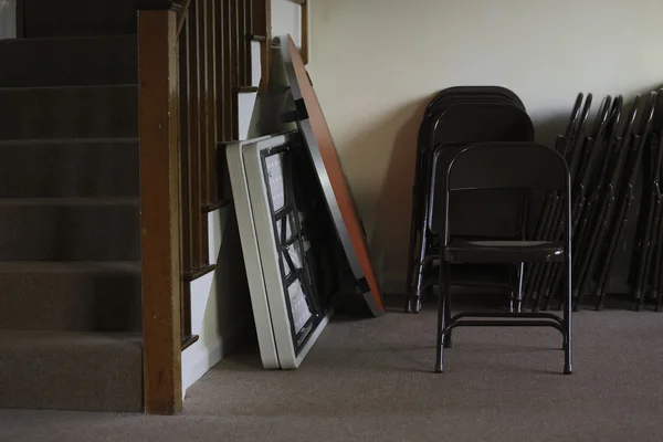 Folding tables and chairs Stock Image