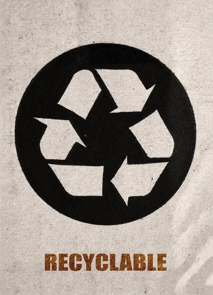 Recyklované symbol na kartonu — Stock fotografie