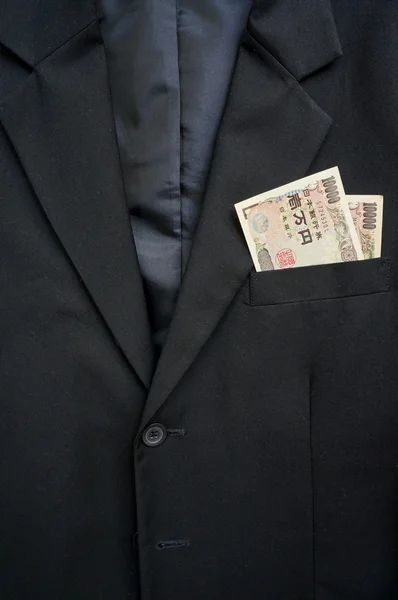 Argent dans la poche du costume d'affaires — Photo