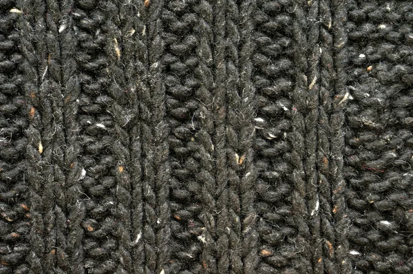 Background of black knitted fabric — Stock Photo, Image