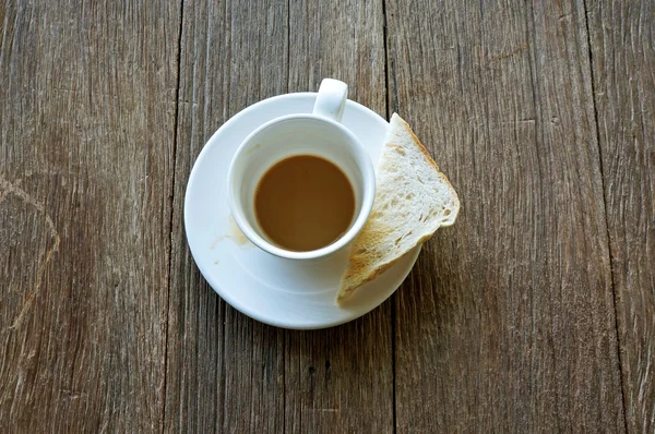 Φλιτζάνι καφέ με φέτες ψωμί — Φωτογραφία Αρχείου