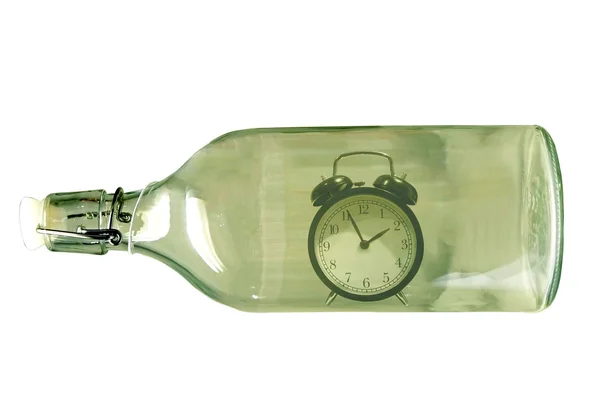 Alarm clock inside an old glass bottle — Stock Photo, Image