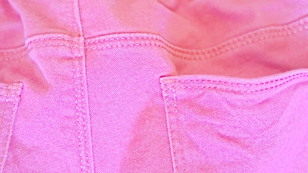 Bolso em calças rosa — Fotografia de Stock