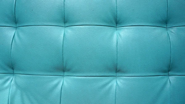 Closeup textura vinobraní Modrá kožená pohovka pro pozadí — Stock fotografie