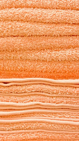 オレンジ色のタオルのクローズ アップのスタック — ストック写真