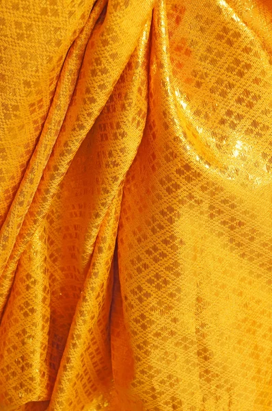 Złota tkanina tekstura tło — Zdjęcie stockowe
