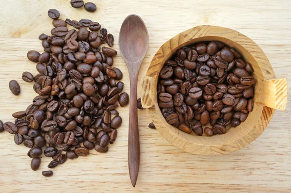 Coffee bean in wooden bucket — Stock Photo, Image