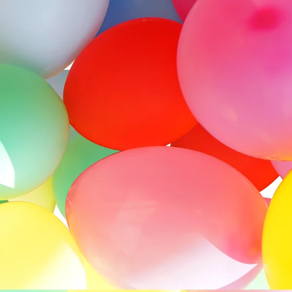 Many colored balloons background — Stock Photo, Image