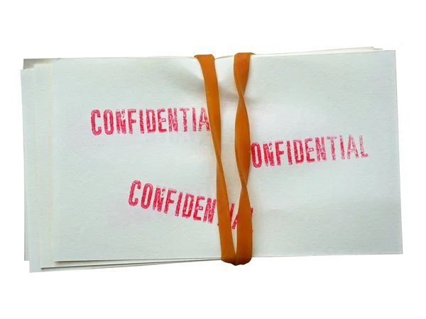 Stack of papers, stamped confidential. — Stock Photo, Image