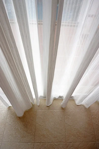 White curtains with the tile floor — Stock Photo, Image