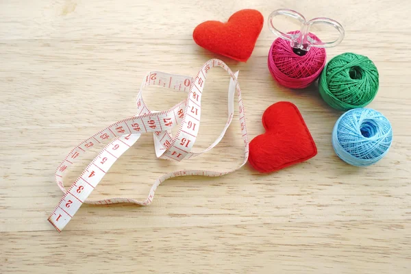 Sewing kit, needles, thread and measuring tape — Stock Photo, Image