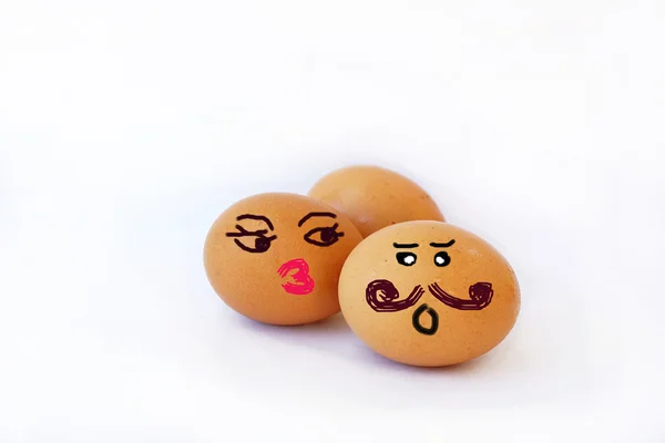 Ouă cu fețe zâmbitoare desenate, bărbat și femeie — Fotografie, imagine de stoc