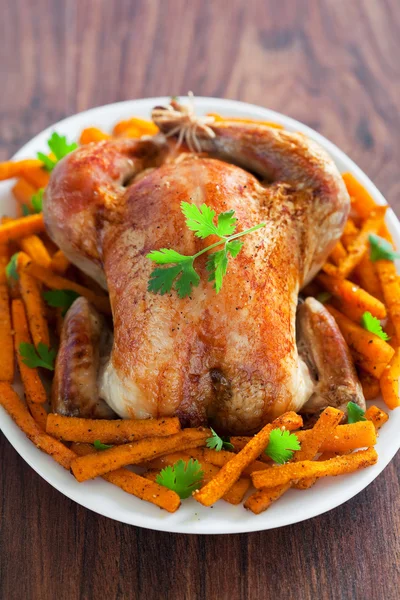 Roasted chicken and spicy pumpkin — Stock Photo, Image