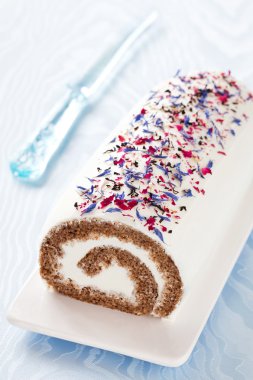 Roll cake with spices clipart