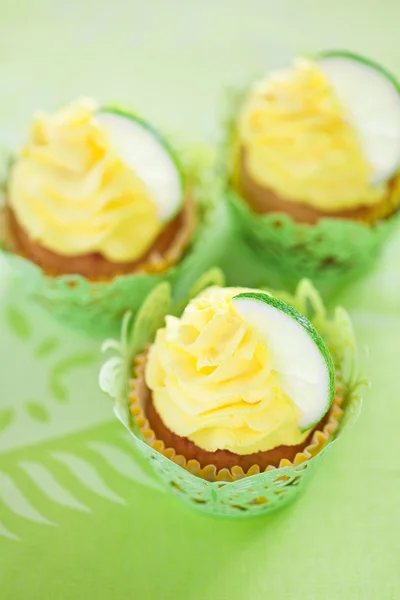 Lime cupcake with lemon cream — Stock Photo, Image