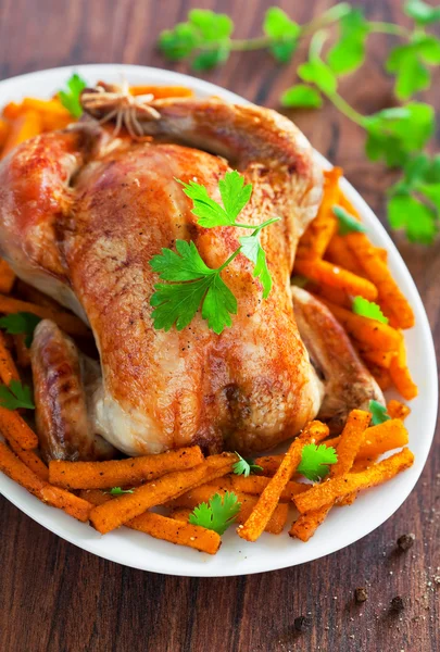 Roasted chicken and spicy pumpkin — Stock Photo, Image