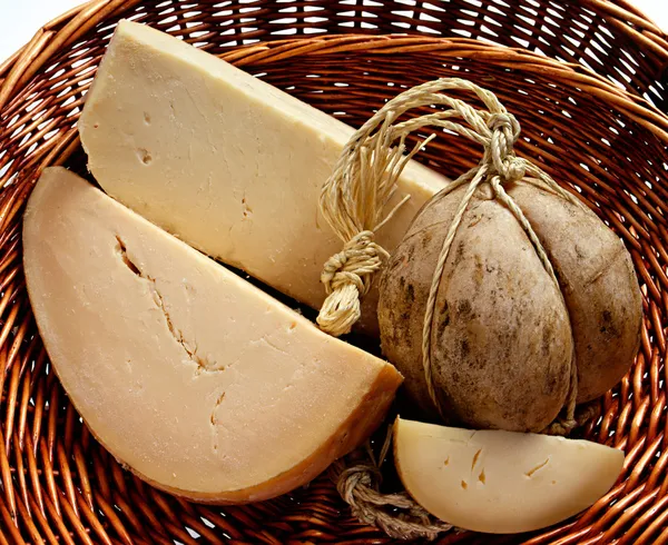 Cheese in a basket — Stock Photo, Image