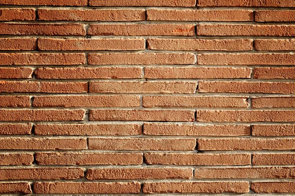 Rough textured brick wall — Stock Photo, Image