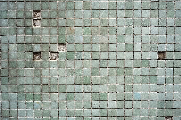 Grungy mosaics with missing tiles — Stock Photo, Image
