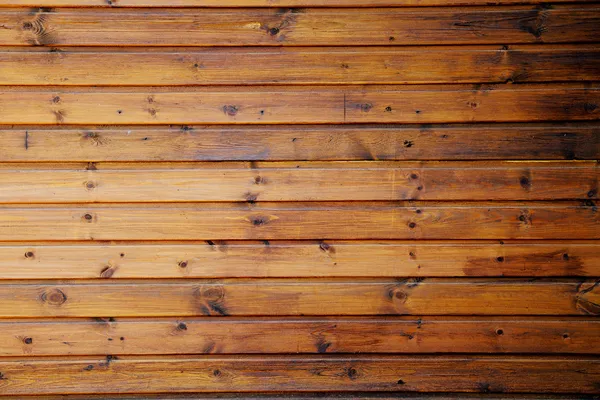 Stained timber boards with knots — Stock Photo, Image