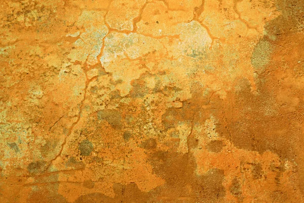Grungy ochre wall with cracks — Zdjęcie stockowe