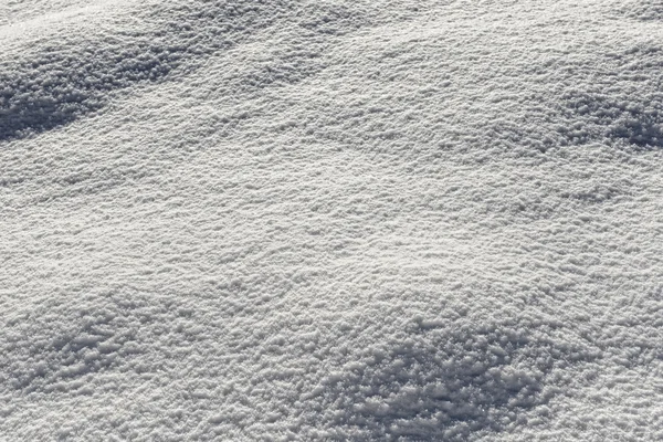 Superfície irregular de neve fresca do inverno — Fotografia de Stock