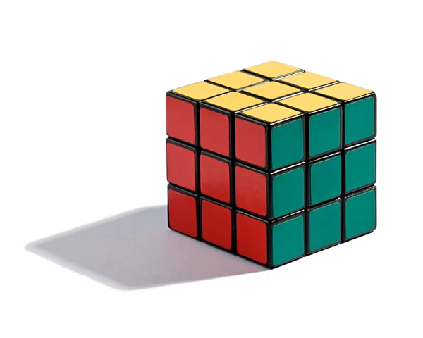 Solved Rubiks Cube puzzle on white — Stock Photo, Image
