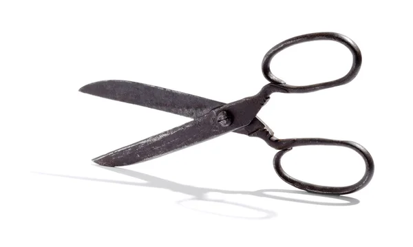 Pair of large steel scissors balanced on edge — Stock Photo, Image